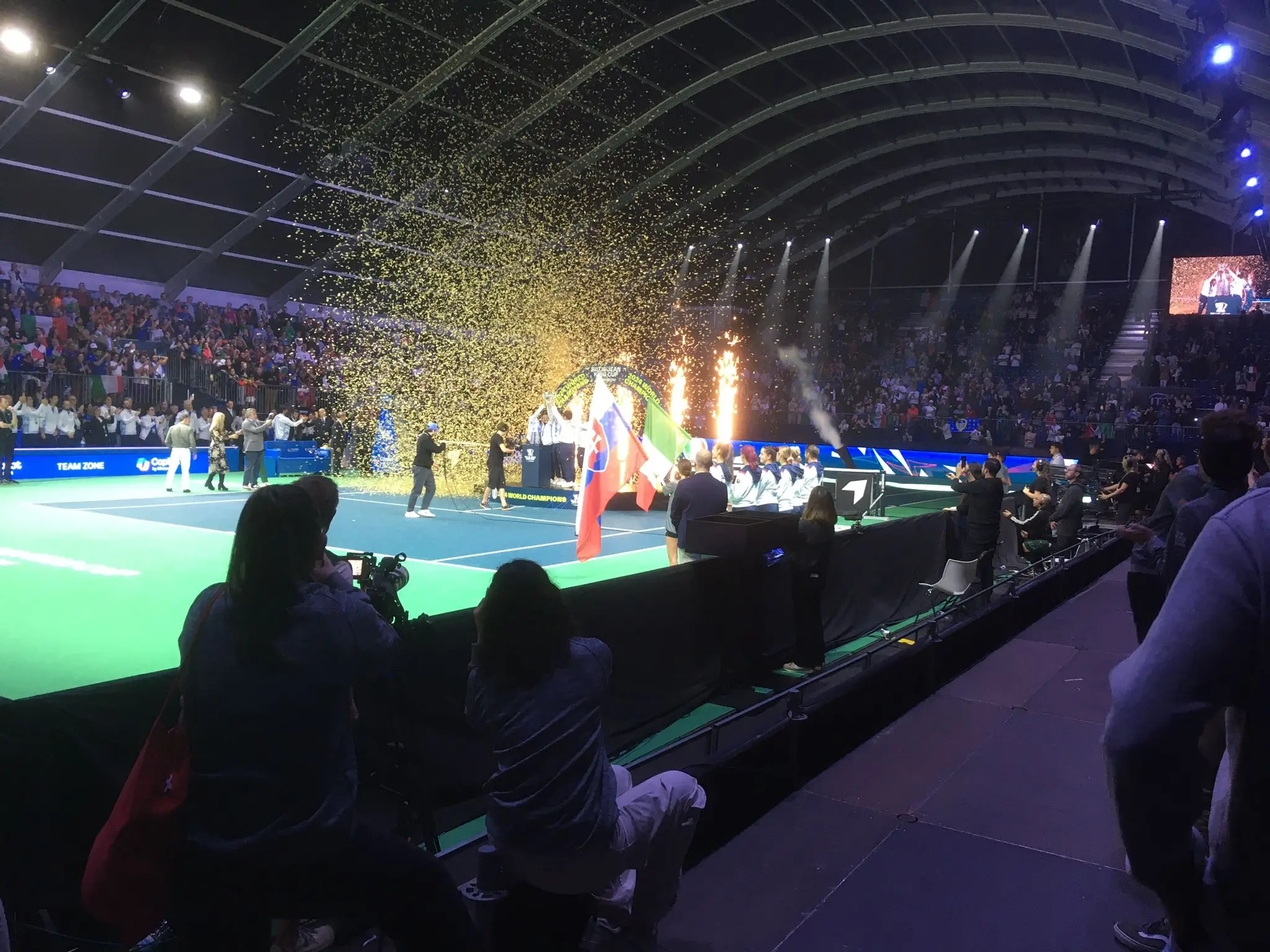 Spectacular celebration at the Billie Jean King Cup 2024 with confetti, fireworks, and professional lights and sound system.